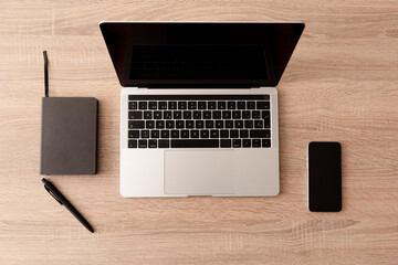 Working from home concept. View from above of the minimalist setup of a digital content creator on...