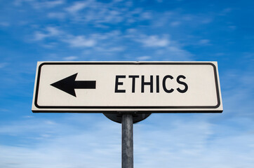 Ethics road sign, arrow on blue sky background. One way blank road sign with copy space. Arrow on a pole pointing in one direction.