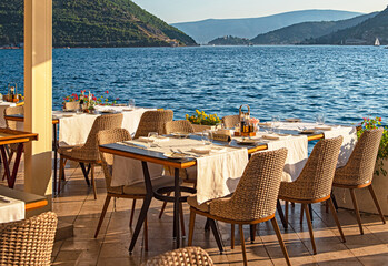 Beautiful restaurant at the sea, afternoon, eating out concept