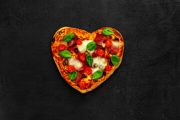 Fototapeta premium .Heart shaped pizza tasty love concept Valentine's Day design romantic restaurant dinner Italian food.