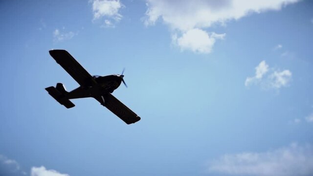small jet plane flying in the sky, small aviation concept, shadow in heaven, silhouette