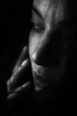 Emotional Sensual black and white portrait of a beautiful girl on a dark background