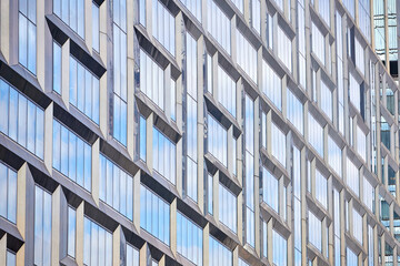 Fototapeta premium Glass facades of office buildings for background