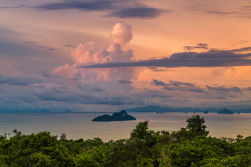 Fototapeta na wymiar Landscape with beautiful sunset and fiery clouds in the Adaman Sea on Phi Phi Island. Thailand