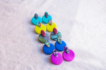 Choice of colorful errings of polymer clay. Summer collection.