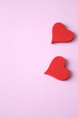 Two Hearts for Valentine's day concept on pink pastel color background with shadow.  Pink background. Valentines day. Wedding invitation design. Healthy. Love. 