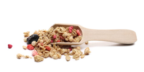 Red fruits cereal mix with wooden spoon, fruity and crunchy muesli with dried raspberry, strawberry, cherry chunks isolated on white background 