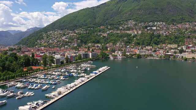 Aerial drone footage of the Locarno city by lake Maggiore in Canton Ticino in Switzerland