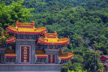 Fototapeta premium Chinese temple on the territory of Kek Lok Si Buddhist complex, Penang island, Malaysia