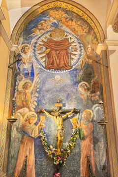 BARCELONA, SPAIN - MARCH 4, 2020: The modern fresco of Holy Trinity in church Iglesia Sant Angel Custodi from 20. cent.
