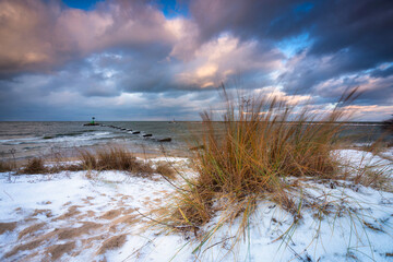 Winter landscape of a snow covered beach at Baltic Sea in Gdansk. Poland