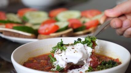 Close up of traditional ukrainian beetroot soup, borshch. Healthy tradional cuisine vegan option 