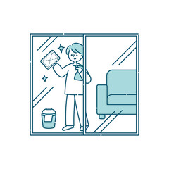 窓拭きをする男性