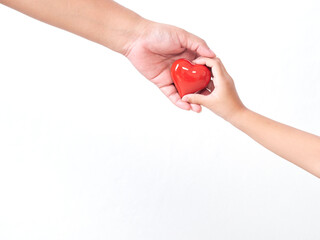 Heart in child and mother hands