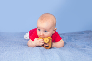Five month baby on a blue background
