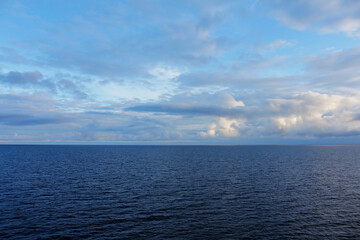 Blue sea with beautiful clouds