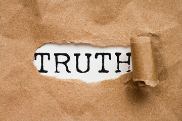 Truth. Torn Paper reveal the word truth in a folder