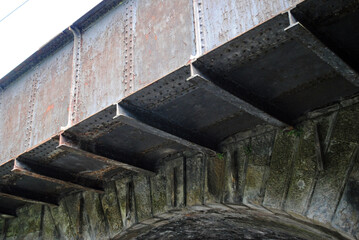Close Up of Steel Girders on Old Stone Railway Bridge 