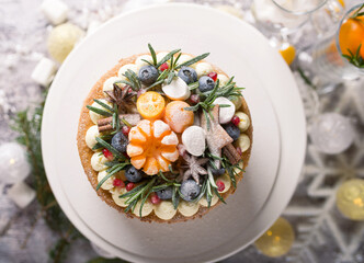 2021 is the year of the bull. Christmas or New Year decorated cake with cream cheese