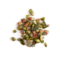 Unakite pebbles isolated, pink and green altered granite stones