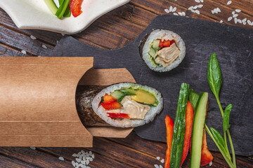 Still life. Japanese cuisine- roll in a package