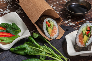 Still life. Japanese cuisine- roll in a package