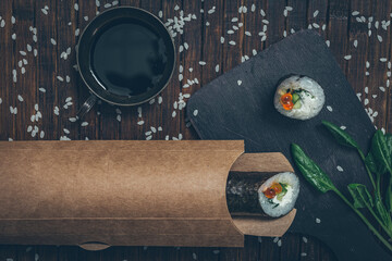 Still life. Japanese cuisine- roll in a package