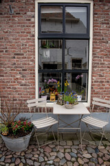 Fototapeta na wymiar patio with flowers. Elburg, Holland, the Netherlands.