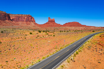 Aerial view of highway road and monuments in Monument Valley park. Arizona, USA landscape