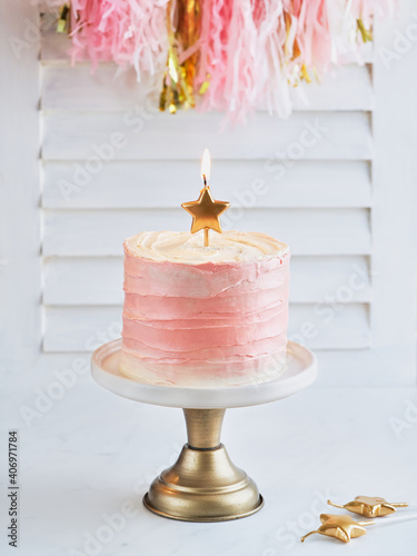 Happy birthday cake shot on a white light background with golden stars candles and space for text. Romantic Celebration Party concept, Valentine's, Mother's Day, Birthday Cake card. Spring time.