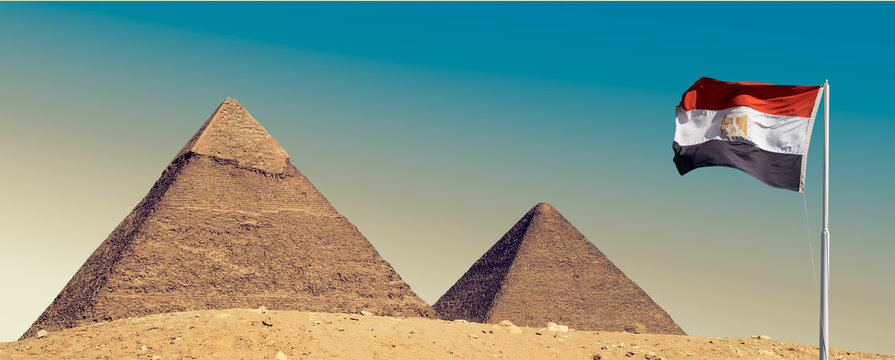 Egyptian pyramids with Egypt flag as Egyptian symbols for your travel concept about Cairo or excursion tour to Giza.