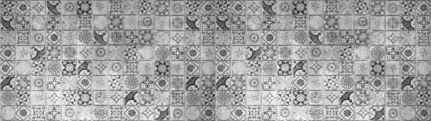Fototapeta na wymiar Gray grey anthracite vintage worn retro geometric square mosaic motif cement tiles texture background banner panorama 
