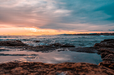 Fototapeta na wymiar Sunset on the beach in Europe Long exposure