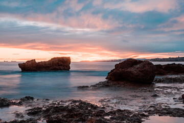 Fototapeta na wymiar Sunset on the beach in Europe Long exposure