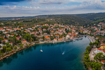 Naklejka na ściany i meble Splitska bay on Brac island view, Dalmatia, Croatia. Aerial drone panoramic picture. August 2020