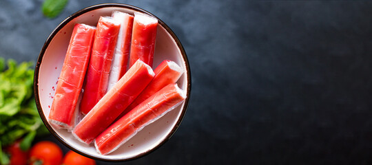 crab stick seafood semi-finished fish mince diet pescetarian on the table meal snack  top view copy space for text food background rustic image  © Alesia Berlezova