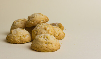 Closeup round butter biscuits. Cookies on a colored background. Dessert, sweetness, lunch
