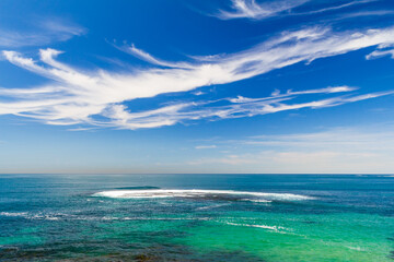 Vivid Clouds Cronulla Beach, New South Wales, Sydney, Australia. Bright sunny day ocean view
