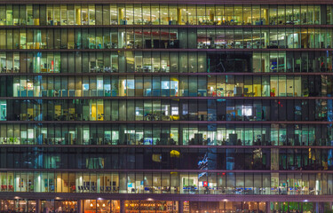 Fototapeta na wymiar LONDON, GREAT BRITAIN - SEPTEMBER 17, 2017: The offices on the riverside at night.