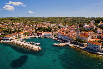 Town of Sutivan skyline view, Island of Brac, Croatia. Aerial drone view in august 2020