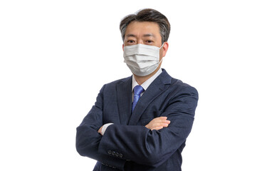 Portrait of a middle-aged Asian businessman wearing a white face mask. White Background. Covid19, Health, and Business Concepts.