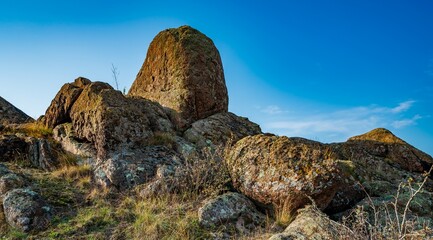 Huge deposits of stone minerals in a clearing bathed in warm sun
