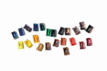 Top view of Work Process Blank Watercolor Paper pad, Watercolor Painting Supplies, Brushes and Colorful Pencil. Creation process of watercolor painting. Copy space.