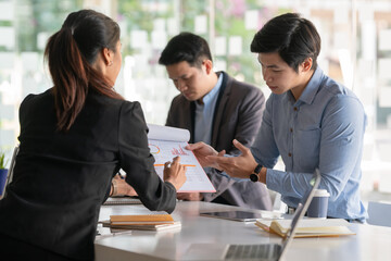 Young business team working with business report document on office desk. Brainstorming Business People Design Planning, Brainstorming Planning Partnership.