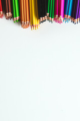 Variety of color pencils isolated on white background