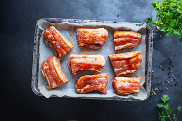 ribs raw tomato sauce grill bbq marinated barbecue pork meat fresh meal snack outdoor top view copy space for text food background rustic image