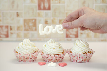 Homemade muffins for Valentine's Day. Photo 4: Decorating the dessert with the word 