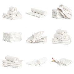 set of white spa Folded clean soft towels on white background