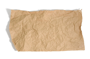 piece of brown parchment paper with torn edges isolated on white background