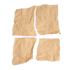 four torn pieces of brown kraft paper isolated on white background